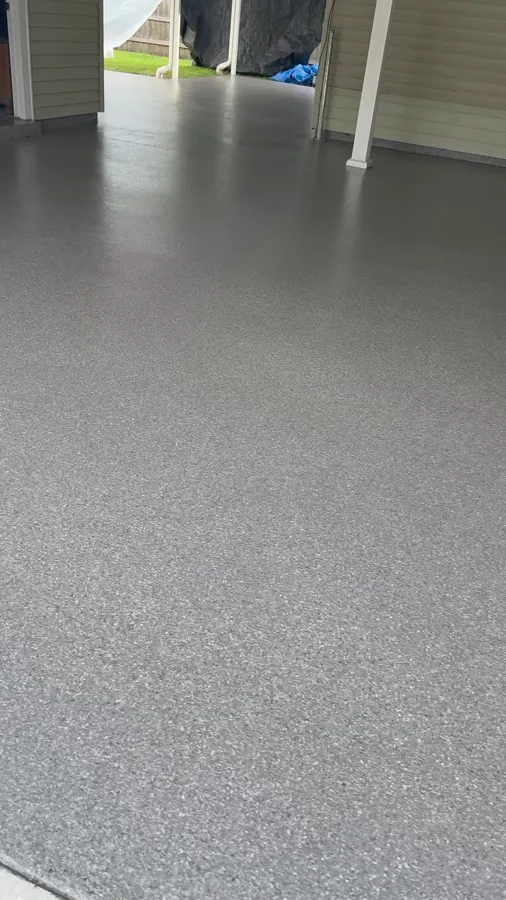 Smooth grey coating on a covered residential patio