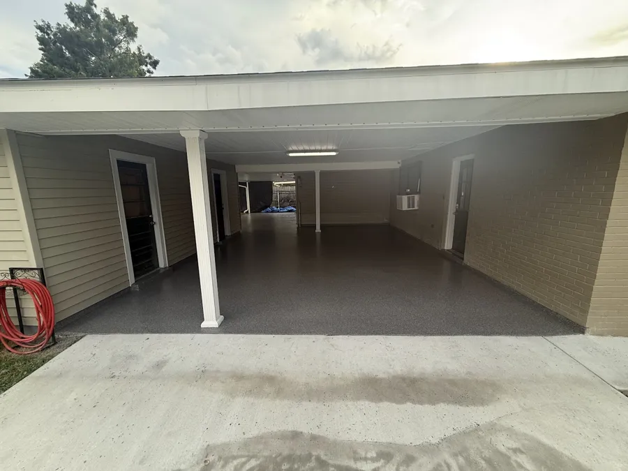 Solid grey coating across a residential garage floor