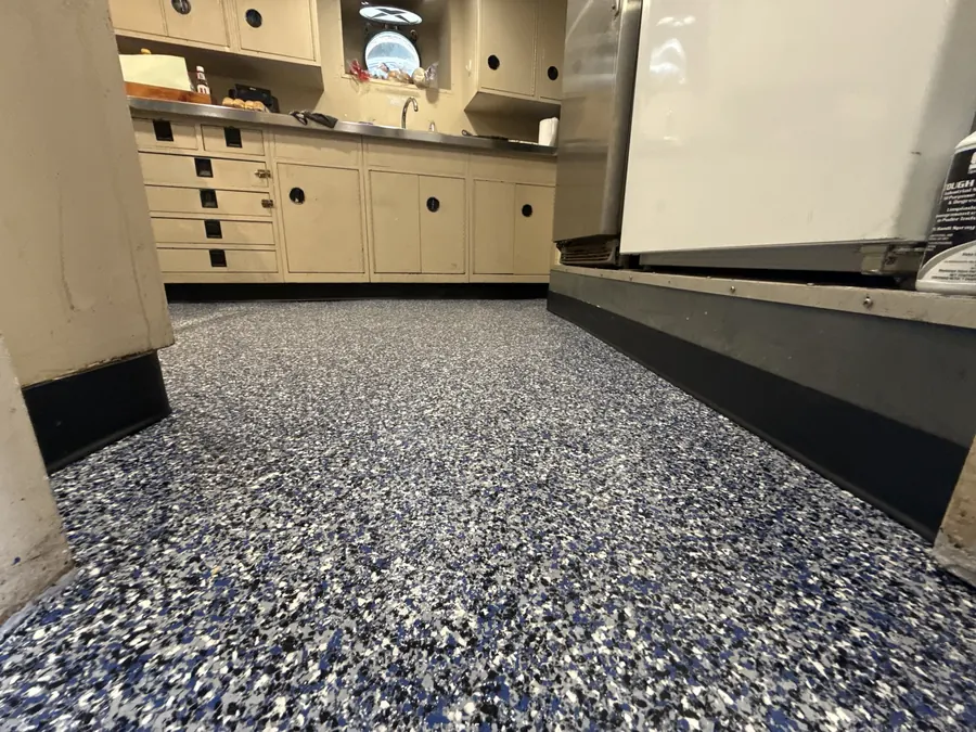 Low-angle view of flake flooring in a vessel galley