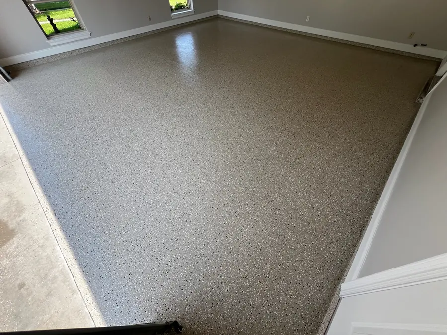 Light flake floor filling a garage corner to corner