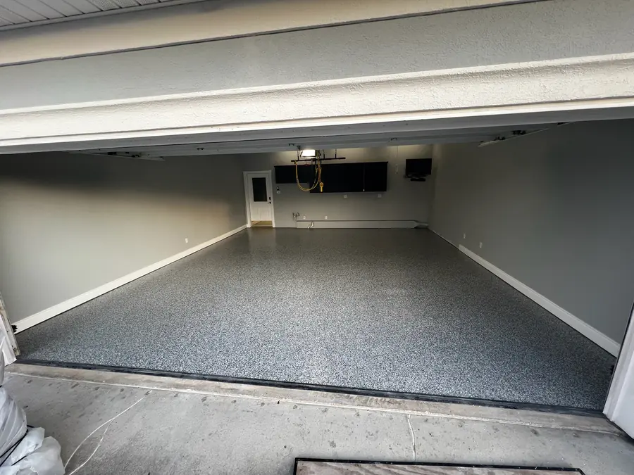 Finished grey flake floor in a two-car garage